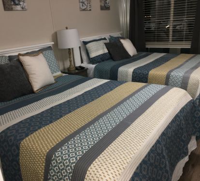 Bedroom with two queen beds.
