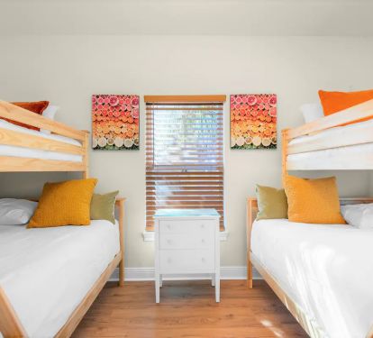 Shipwatch-19...1st floor. Bedroom 2. Photo 1. Two twin over full bunks with wall mount TV. Sleeps 6.