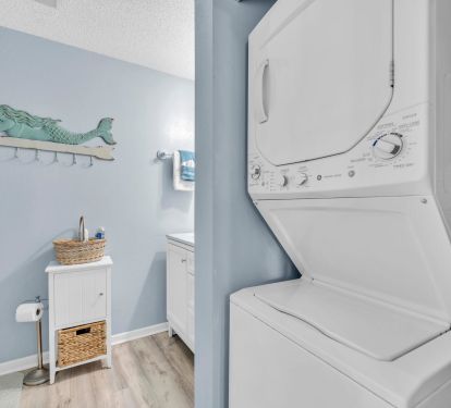 Full size washer/dryer located in master bath!