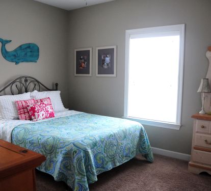 First floor bedroom with a queen size bed