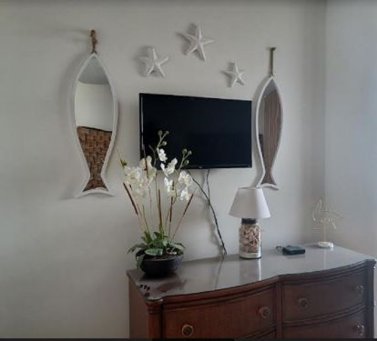 Guest bedroom also has smart tv and balconly access.