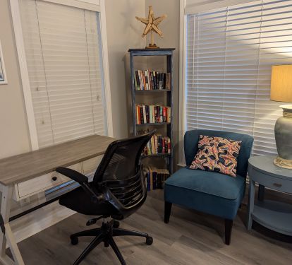 The book nook has a desk for reading and charging your devices.