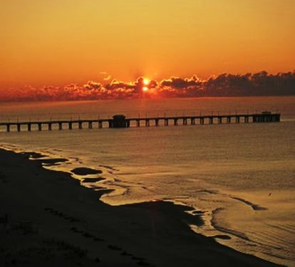 Wake up to the sunrise with morning coffee.