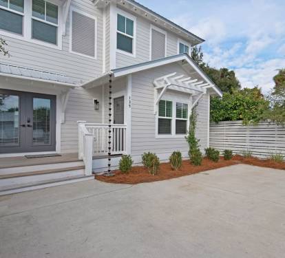 Large, wide driveway can fit three cars side-by-side. No car shuffling!