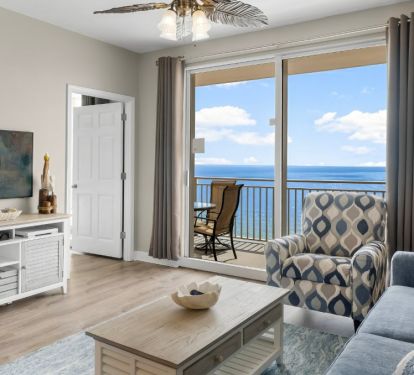 Bright, coastal living room with stunning Gulf views!