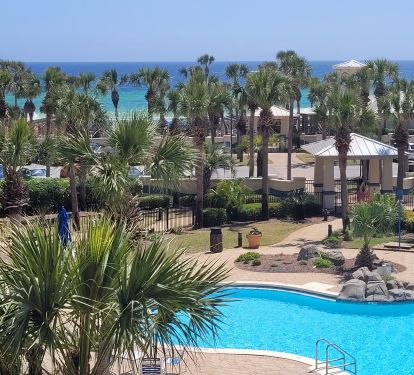 Great gulf view with free form pool and tropical landscaping. 