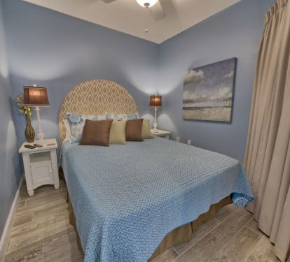 Queen bed in the second bedroom!  Room darkening curtains!