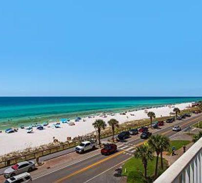 Full Views of the White Sandy Beach and Emerald Waters from the Balcony