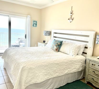 Master bedroom with balcony access and private bathroom 