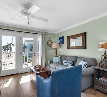 Living room with patio doors leading to balcony
