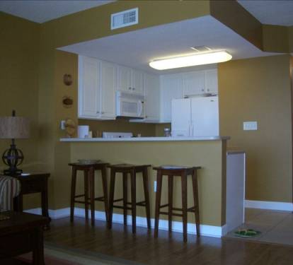 breakfast bar looking into the kitchen