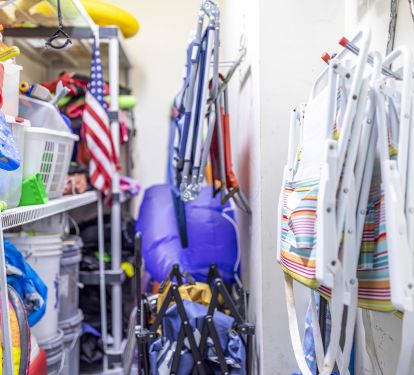 Storage closet with chairs, umbrellas, beach/water toys for your use
