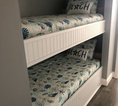 Bunk Beds located in hallway.