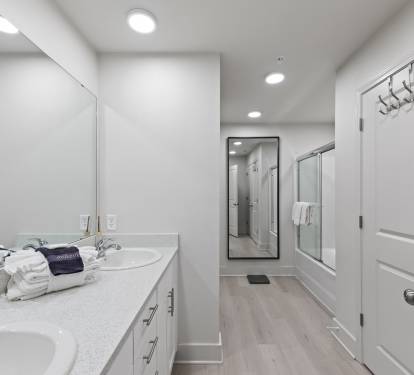 Master bathroom with tub and shower