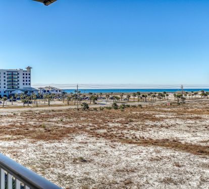 View of Gulf from balcony/easy beach access within a 5 minute walk