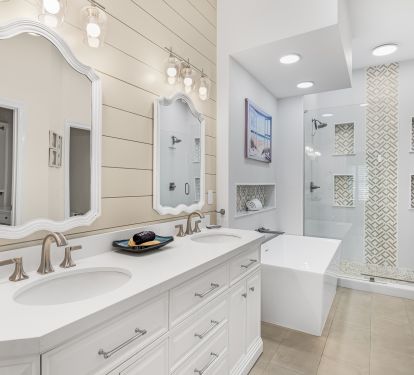 Spectacular master bath has twin-head shower, large soaker tub, custom cabinets