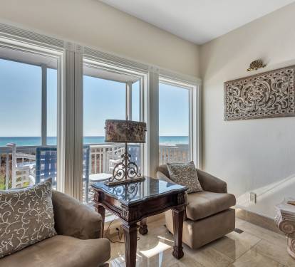 Portion of Family Room showing Ocean through Floor-to-Ceiling Windows 