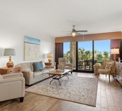 Cozy living area for snuggling up to a movie in front of the giant screen tv.