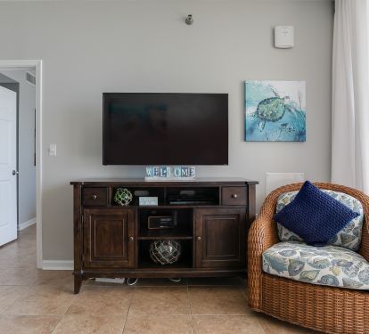 Living Room Smart TV and Master Bedroom Entryway