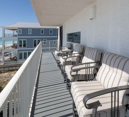 Beach Front Balcony with Chairs and Table
