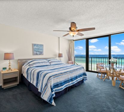 LARGE MASTER BEDROOM, KING BED, TABLE AND CHAIRS, TV ALL GLASS WALL!