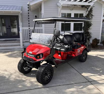 Six seater golf cart included.