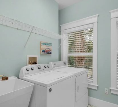 Shenanigans-22 We know that you'll be covered in salt and sand. That's half the fun! The second floor laundry is convenient for all bedrooms.