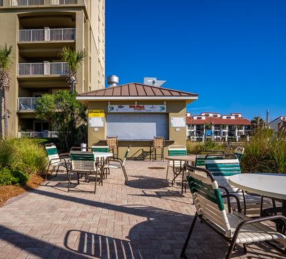 Full service tiki bar and grill, beachside, patio area