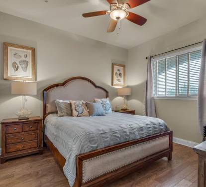Master Bedroom: King Bed, Smart TV, ensuite bathroom, and walk-in closet