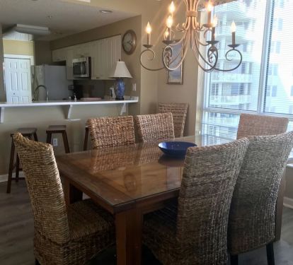 dining room - kitchen has all stainless - bar stools at kitchen bar 