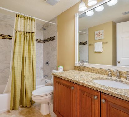 The hall bathroom features a new tub and classy tile tub surround - nice!