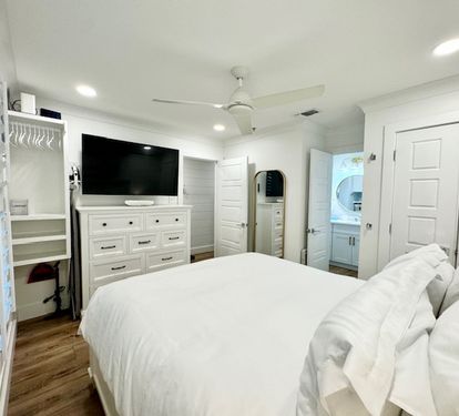 Large Smart TV &amp; Full Length Mirror in Bedroom