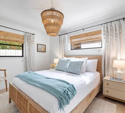 2nd bedroom with queen bed and tv 