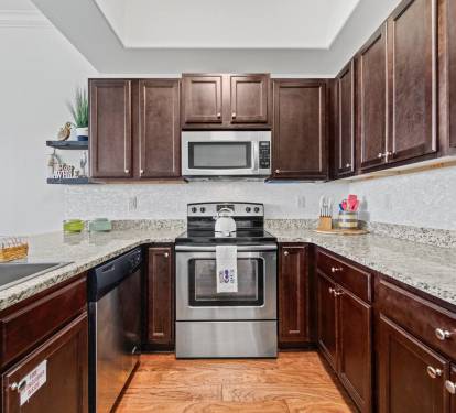 This impressive kitchen boasts stainless steel appliances, providing everything you need to prepare meals on those cozy eat-in nights.