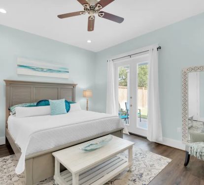 Breeze-13 Bed 1 - Photo 1 - 1st Floor king suite with private bath, private pool entrance, and wall-mounted flat screen tv.
