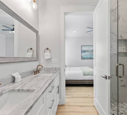 Primary Bathroom Double Vanity and Walk-in Shower