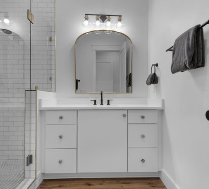 Bathroom with walk-in shower.