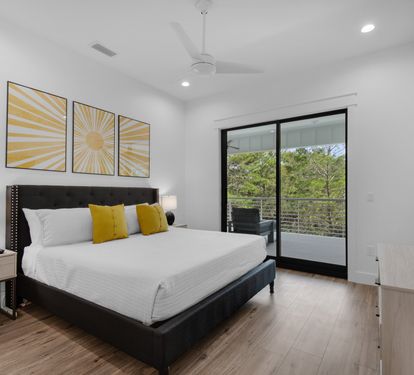 King bedroom with private bathroom and flat screen TV.