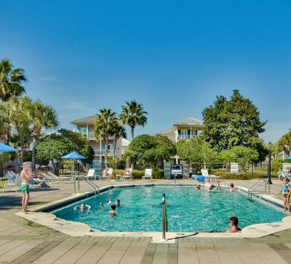 Larger pool in the community - You can see the pool area from end of driveway - heated seasonally