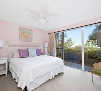 3rd bedroom has king size bed and private bathroom, floor to ceiling windows.