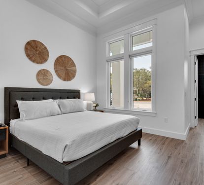 King bedroom with private bathroom and flat screen TV.