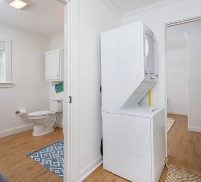 Cottage is equipped with stacked washer and dryer