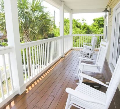 4 Rocking chairs on the private balcony off the Master suite