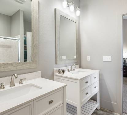 Jack and Jill bathroom has double vanity