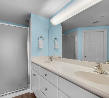 2nd bathroom has its own bathroom with a walk in shower 