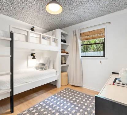 Bunk room with twin over twin and tv 
