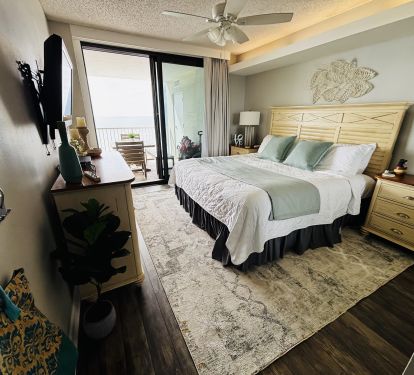 Primary bedroom has a cozy vibe with an ensuite bath.