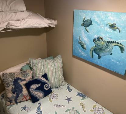 Private twin bed for kids of parents in master bedroom 