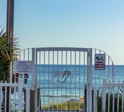 Private gated beach access with free beach service
