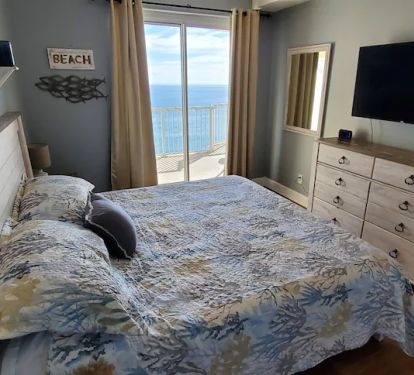 1st Master Suite with amazing Gulf views and balcony access.